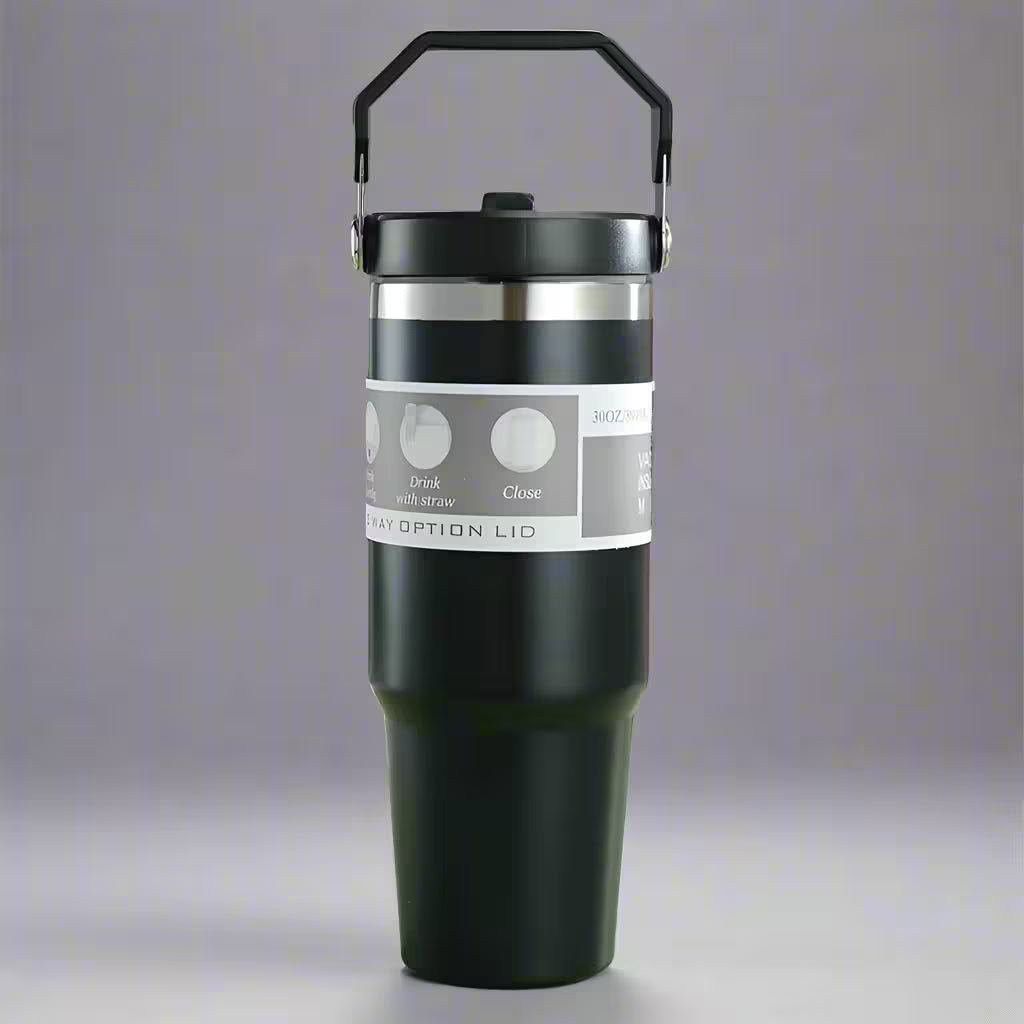 Black insulated mug with a handle on a gray background