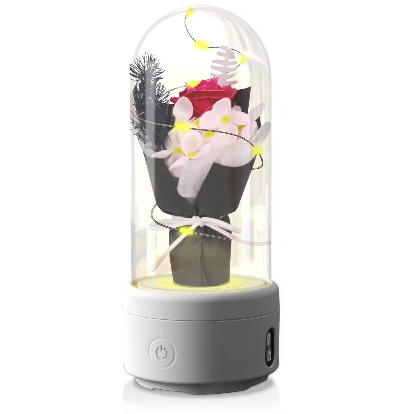 Decorative lamp with flowers inside a glass dome on a white background