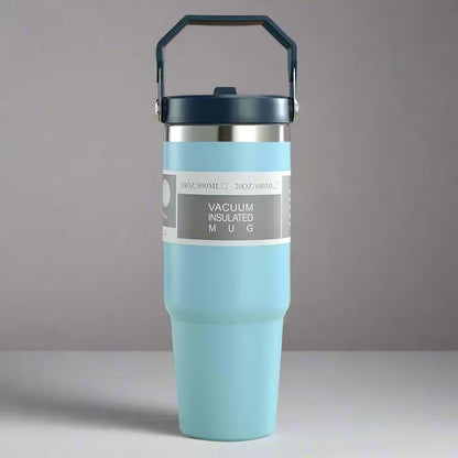 Vacuum insulated mug with a handle on a gray background