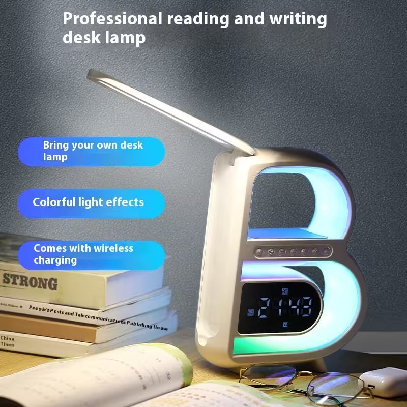Desk lamp with colorful light effects on a desk with books and glasses.