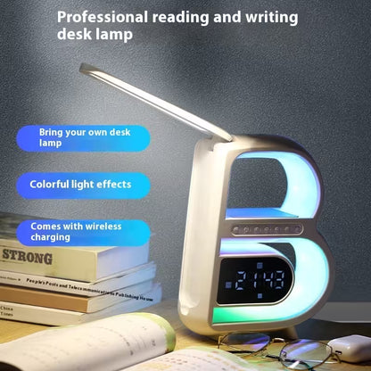 Desk lamp with colorful light effects on a desk with books and glasses.