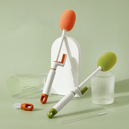 Set of cleaning tools with sponges and brushes on a light green background