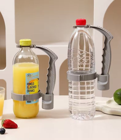 Bottle with pomelo flavored drink and a clear bottle with a red cap on a white surface.
