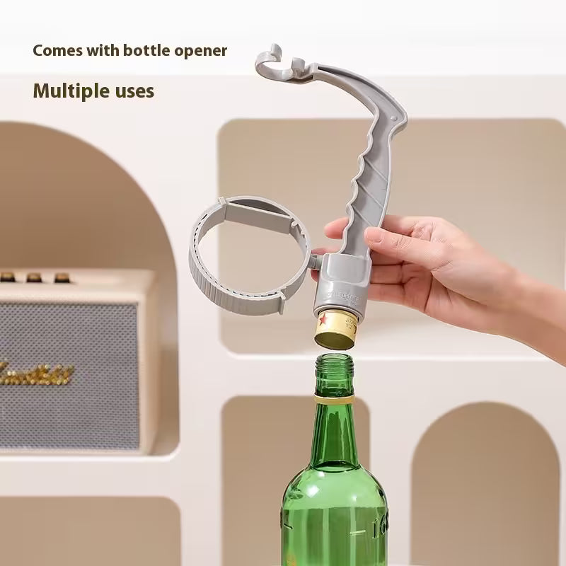 Multi-tool with bottle opener feature being used on a bottle.