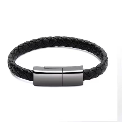 Black braided leather bracelet with a silver magnetic clasp on a white background
