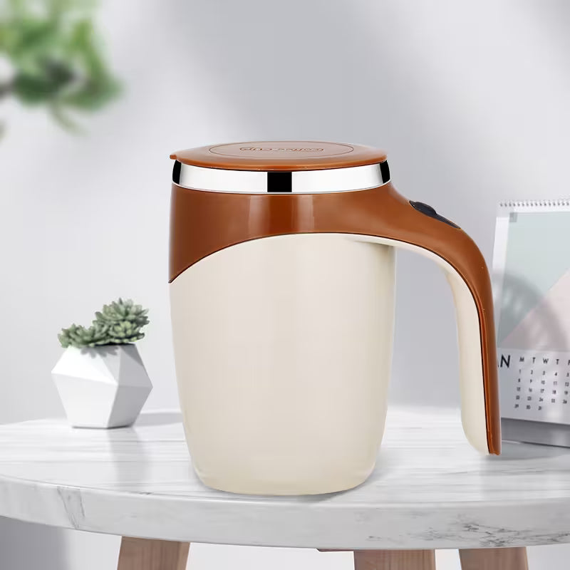 White and brown mug with handle on a marble surface