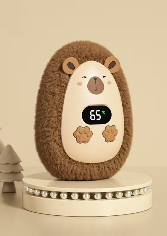 Hedgehog-shaped night light with digital display on a beige background