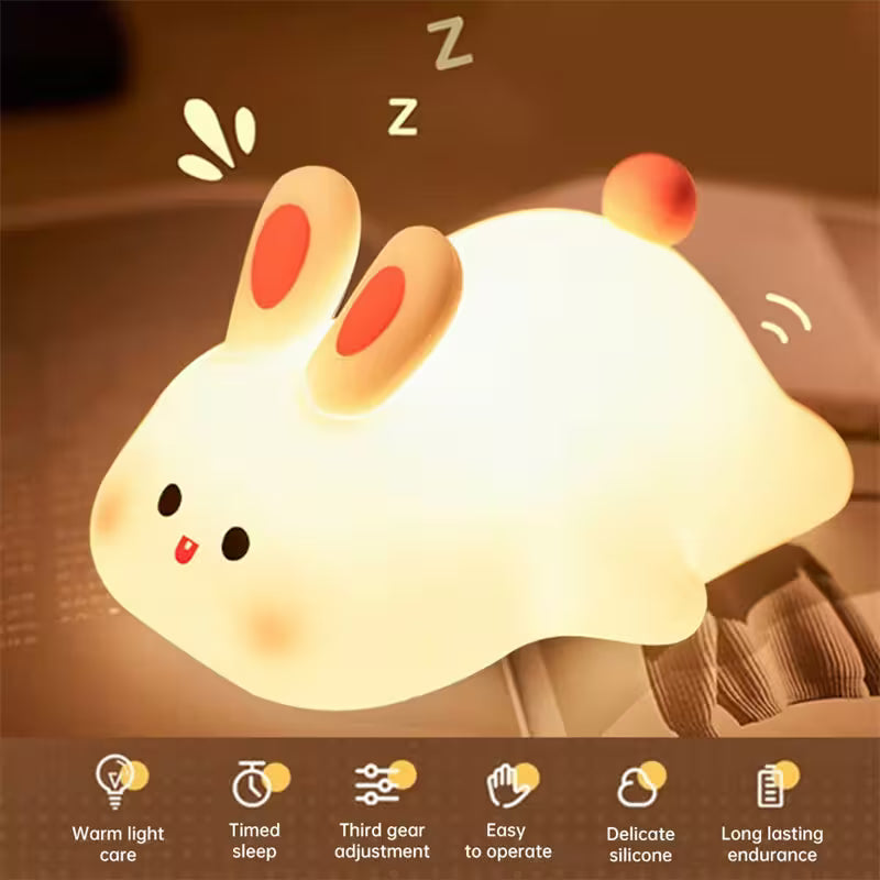 Cute rabbit-shaped night light with features listed below on a warm background