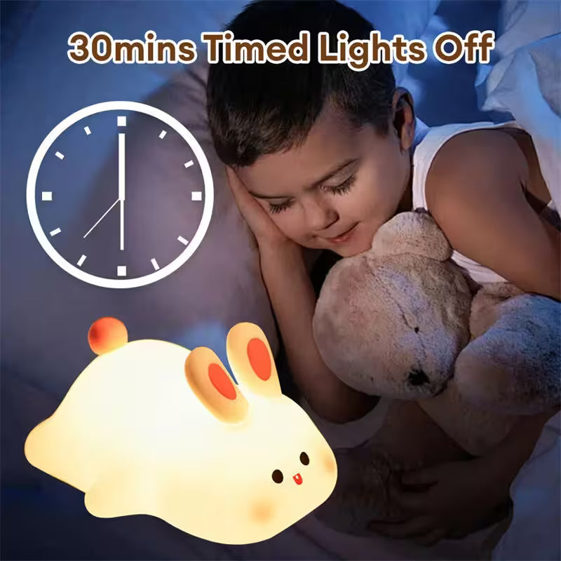 Child holding a teddy bear with a night light and clock icon indicating '30 mins Timed Lights Off'.