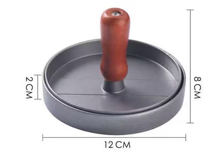 Round metal tool with a wooden handle and dimensions labeled