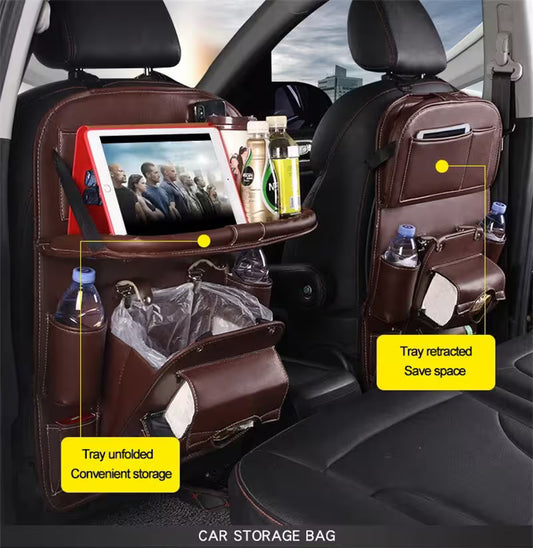 Car storage bag with tray extended and retracted in a car interior.