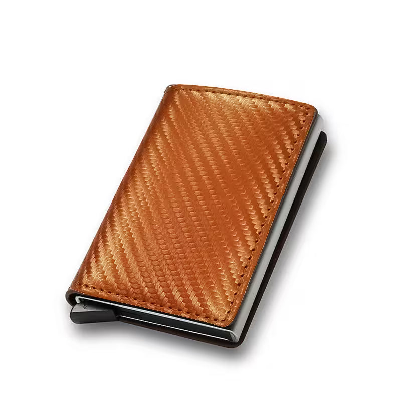 Brown textured wallet with metal trim on a white background