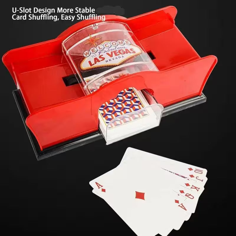 Card shuffling machine with playing cards on a black background