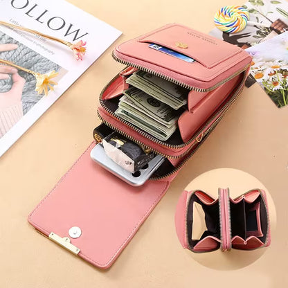 Pink wallet with compartments on a beige surface