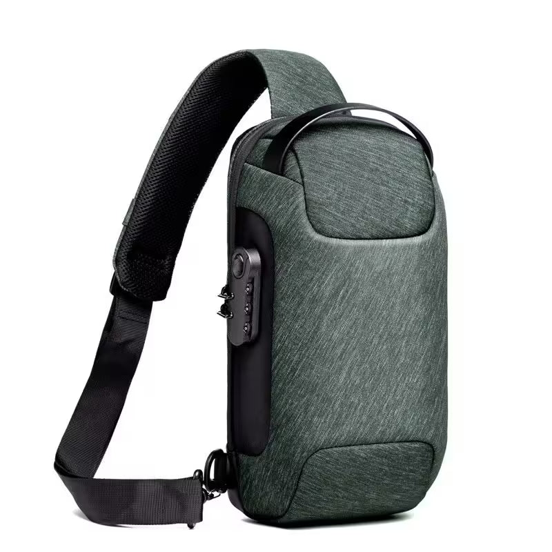 Green shoulder bag with a black strap on a white background
