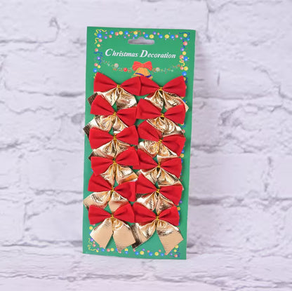 Packaged Christmas decoration with red and gold bows on a textured white background
