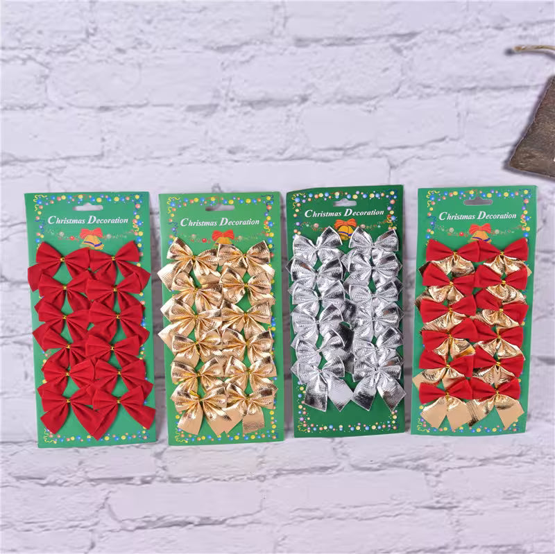 Four packages of Christmas decorations with red, gold, and silver bows on a textured white background.