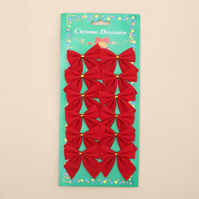 Pack of red Christmas bows on a green card with 'Christmas Decoration' text.
