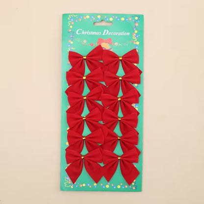 Pack of red Christmas bows on a green card with 'Christmas Decoration' text.