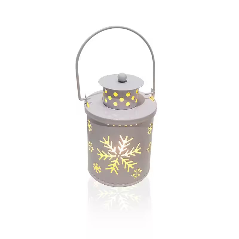 Decorative lantern with snowflake patterns on a white background
