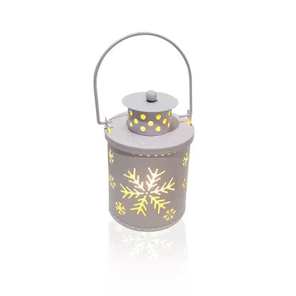 Decorative lantern with snowflake patterns on a white background
