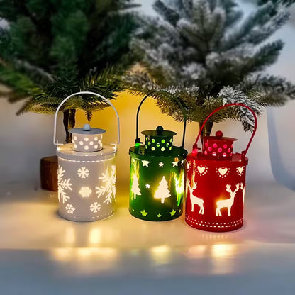 Three decorative lanterns in white, green, and red with Christmas designs, placed against a snowy background.