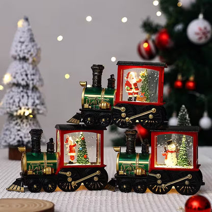 Decorative Christmas train set with Santa Claus and snowman figures in front of a Christmas tree.