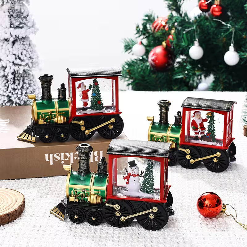 Decorative Christmas train set with Santa and snowman figures in front of a decorated tree.
