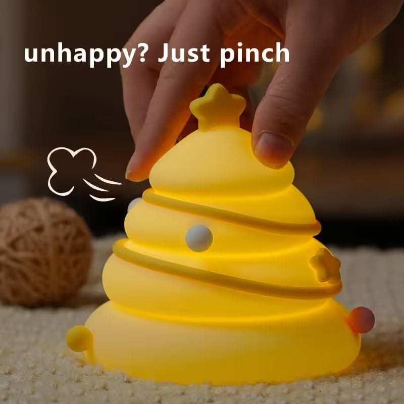 Yellow bee-shaped night light with a hand pinching it, text 'unhappy? Just pinch' above.