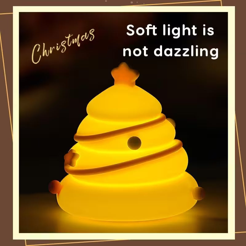 Yellow Christmas tree-shaped light with text 'Christmas' and 'Soft light is not dazzling' on a dark background.