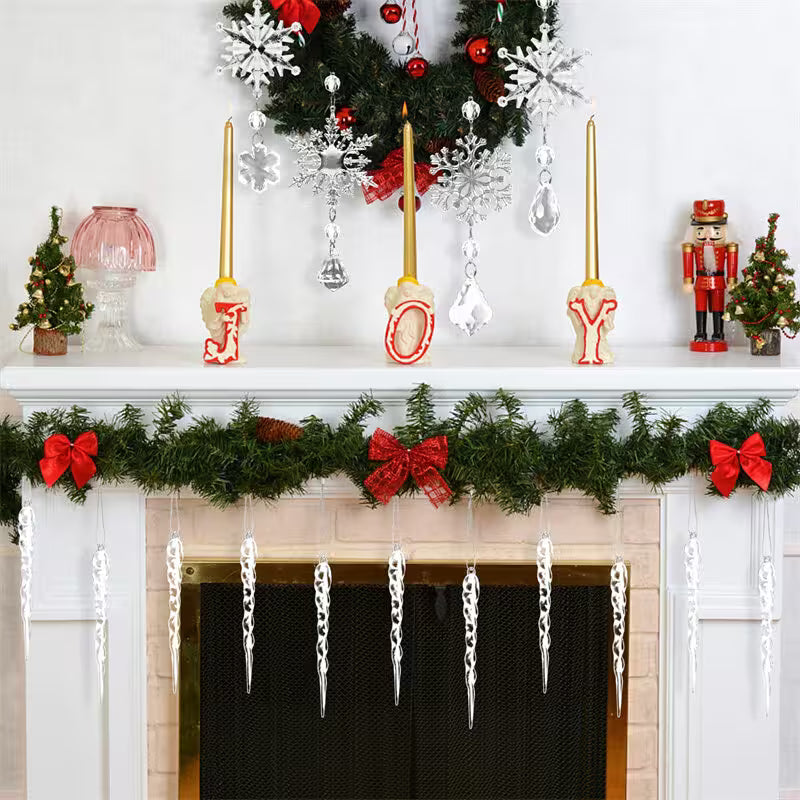 Decorative Christmas mantel with garland, candles, and ornaments.