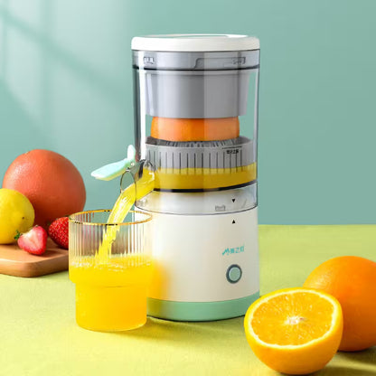 Juicer with oranges and fruits on a green background