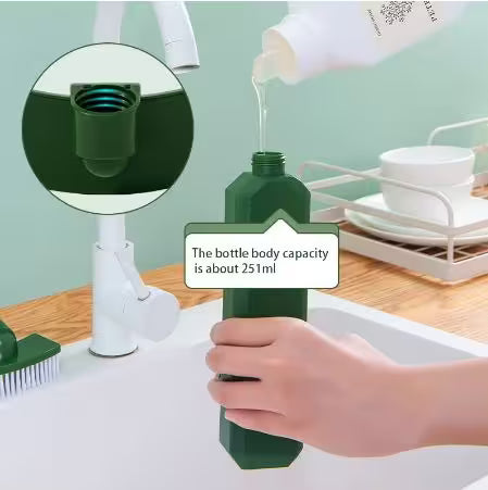 Person pouring liquid from a green bottle into a sink with a close-up of the bottle's nozzle.