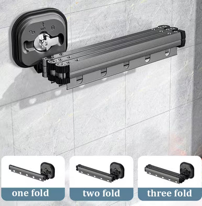 Black shower curtain rod with three fold options on a tiled wall background