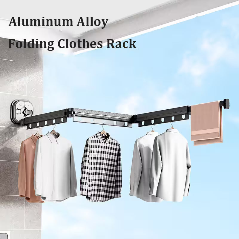 Aluminum alloy folding clothes rack with clothes hanging on it against a blue sky background