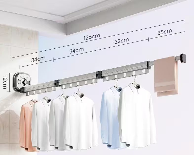 Wall-mounted clothes rack with measurement details and hanging clothes on a white background