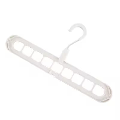 White plastic hanger on a white background