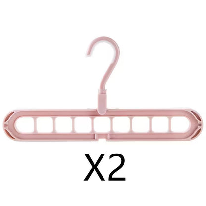 Pink hanger with multiple hooks on a white background