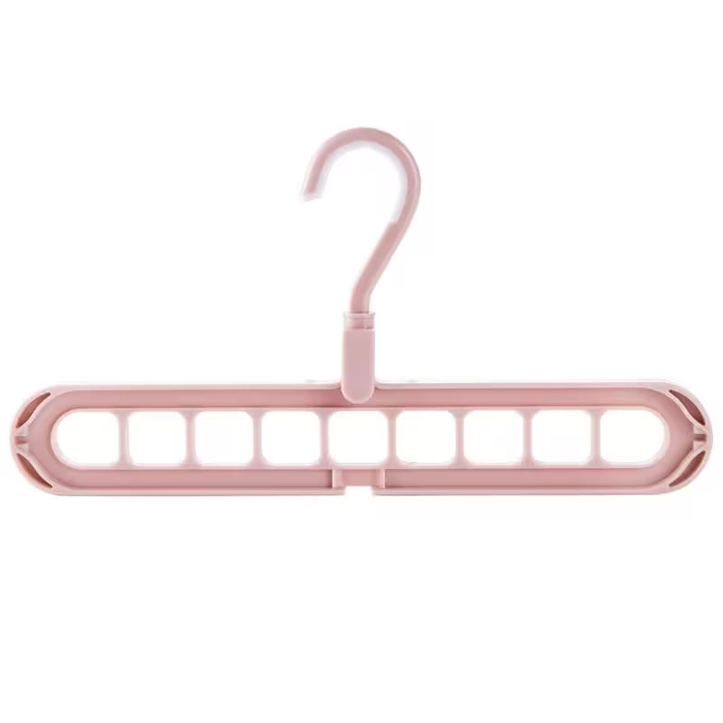 Pink plastic hanger on a white background
