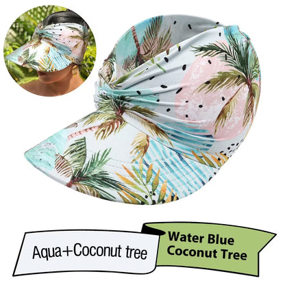 Tropical patterned headscarf with palm trees and watermelon design, shown on a white background.
