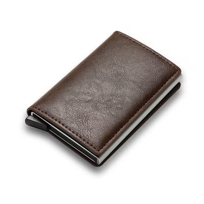 Brown leather wallet with metal clip on a white background