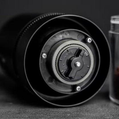 Close-up of a coffee grinder with a blurred background