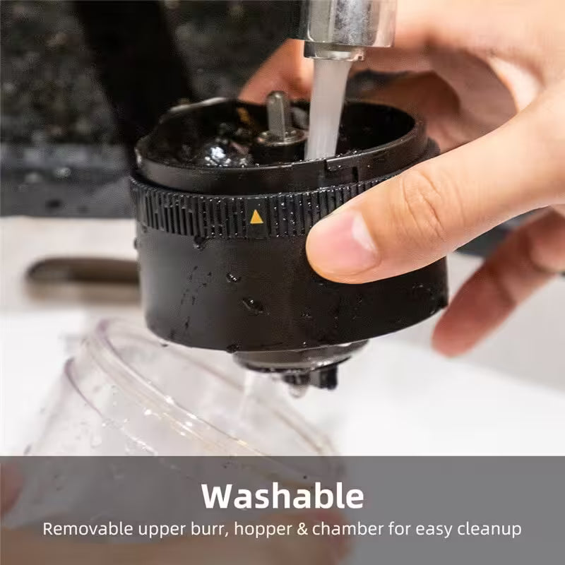 Person cleaning a coffee grinder with water, text indicating washable components.