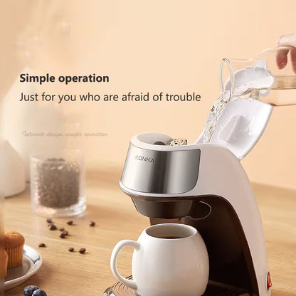 Konka coffee machine being used with a cup on a wooden surface, surrounded by coffee beans and a glass container.