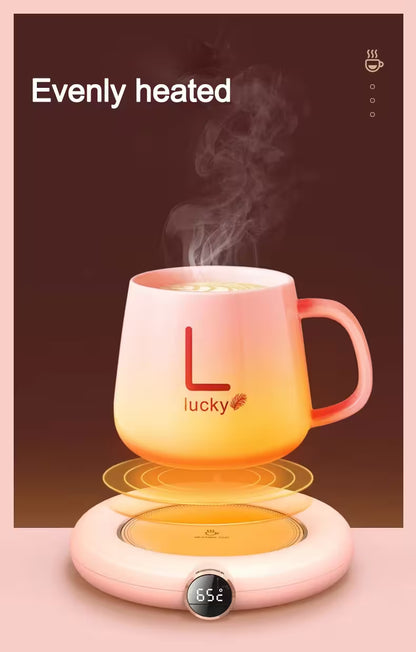 Heated mug with steam on a pink base, displaying 'Evenly heated' text.