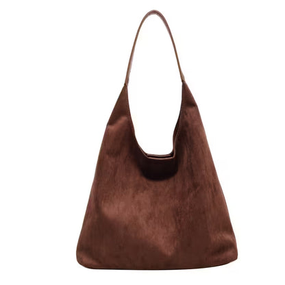 Brown handbag on a white background