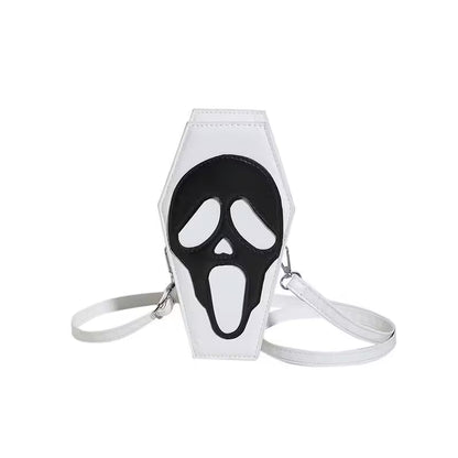 White crossbody bag with black ghost face design on a white background