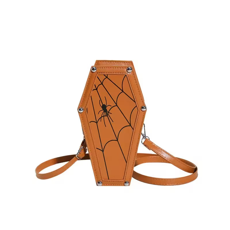 Brown coffin-shaped bag with spider web design on a white background