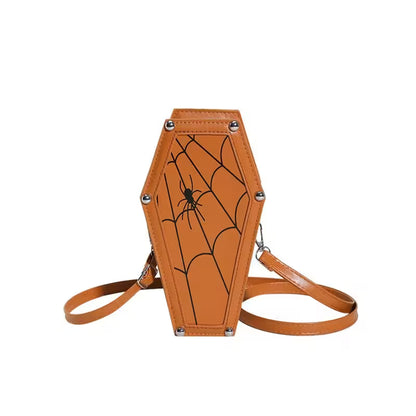 Brown coffin-shaped bag with spider web design on a white background