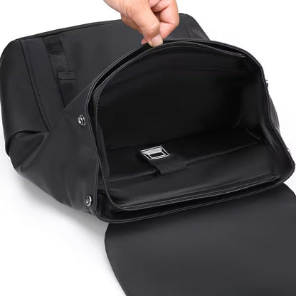 Black bag with a zipper being pulled open on a white background